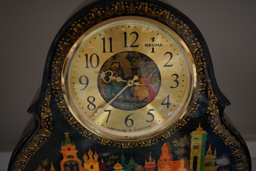 A Becha Russian hand painted black lacquer large mantel clock, 36cm high x 44cm wide